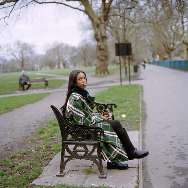 John Glacier sitting on a park bench.